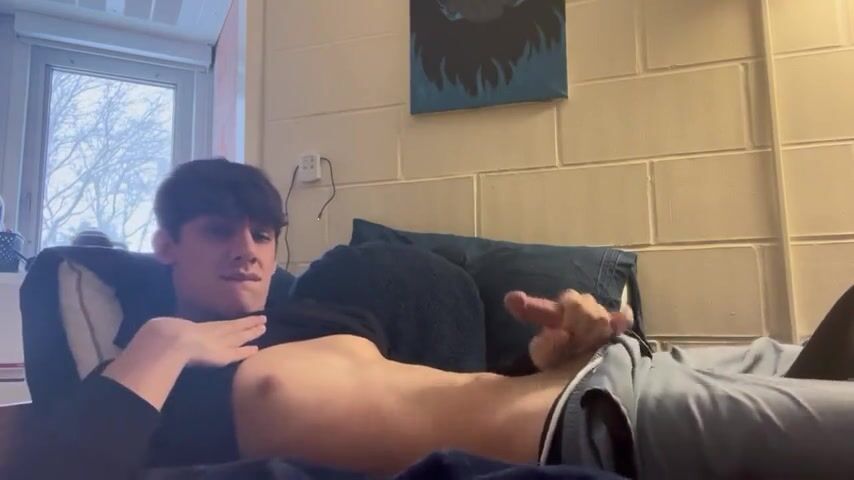 Fit cute brunette jerks off cumming on bed