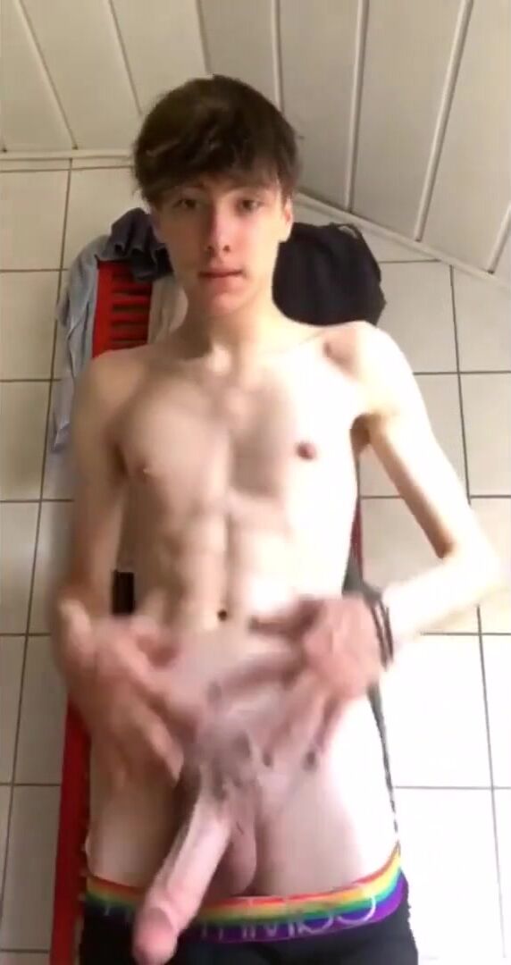 Flirty teen boy strips and teases