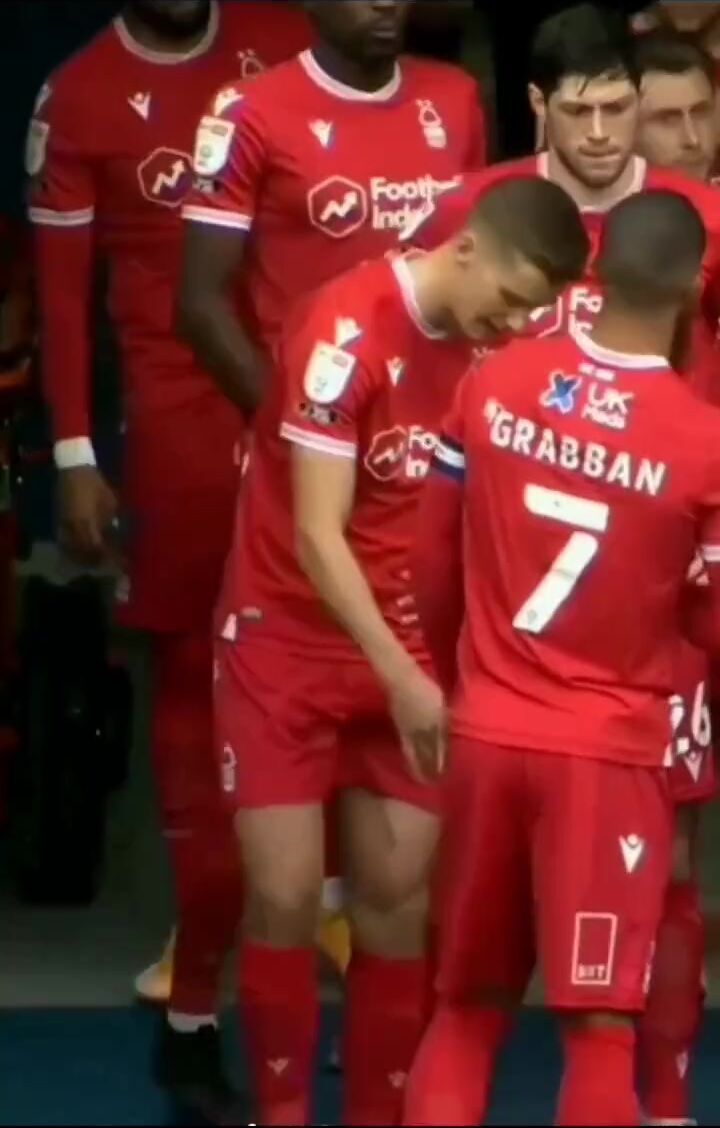 Football player checks his junk is there