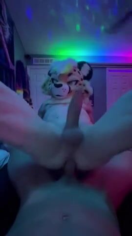 Furry cat strokes huge dick