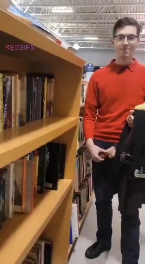 Twink exposes his cock bareback in public library