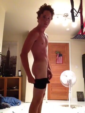 Ginger twink strips and shows cock