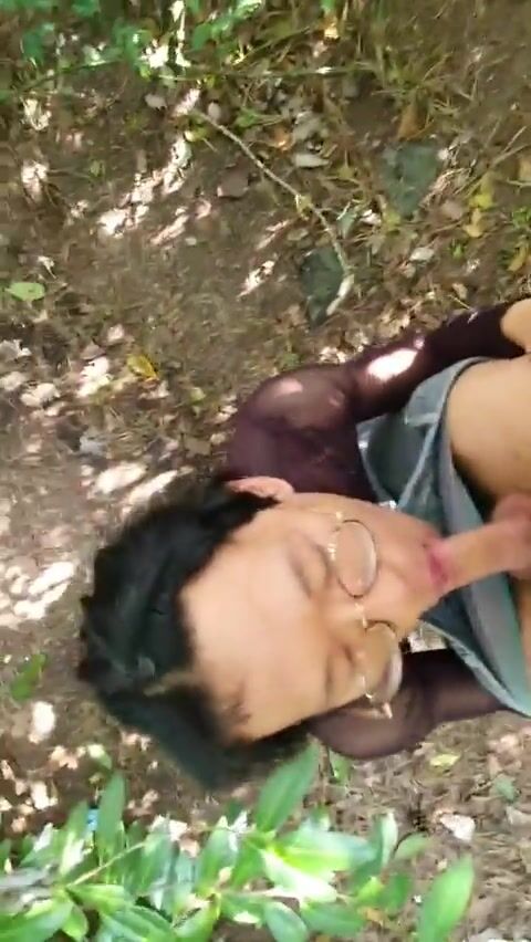 Gaysian in glasses sucks white tourist cock outdoors