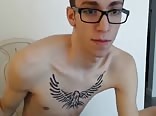 Cam show with glasses and tattoo