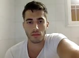 Rapaz bonito verde com pau grande bonito na câmera