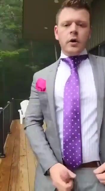 Groom strokes his cock before wedding