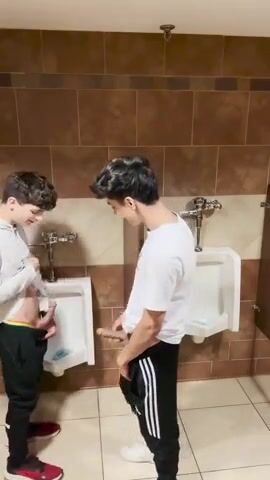 Almost caught, guys messing around in public bathroom