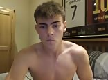 Handsome boy jerks big cock & fingers tight hole