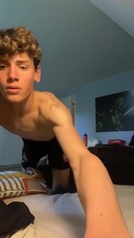Handsome hottie strips for playful boy porn