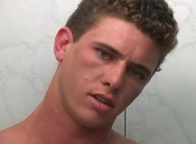 Young guy jerks his cock in toilet