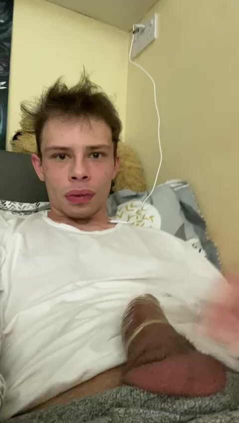 Boy cums hot in condom on his bed