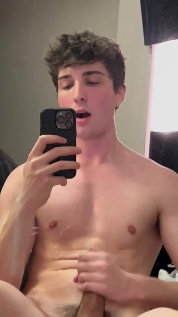 Hot boy wanks hard in mirror until he cums