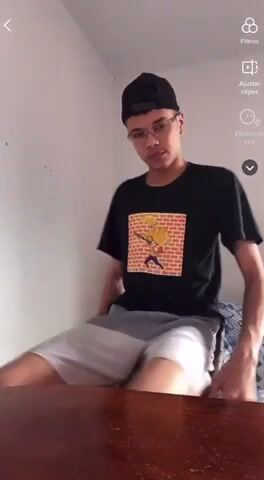 Brazilian hunk shows huge cock on chair