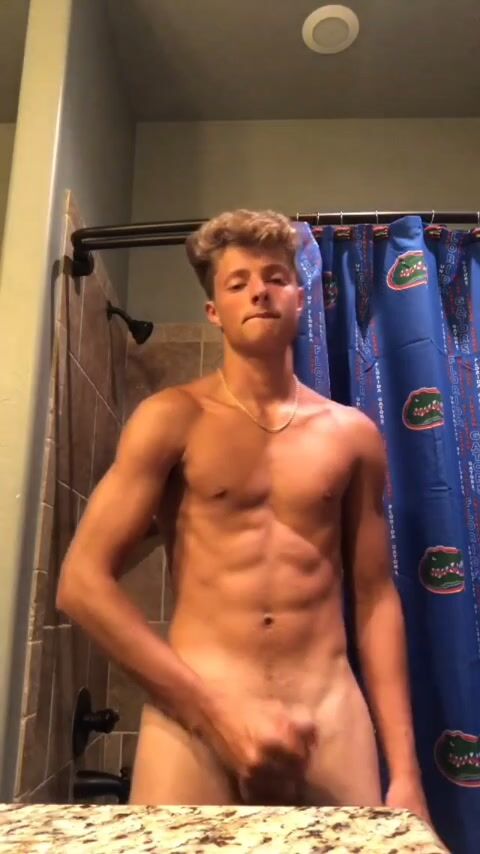 Landon jerks his cock and cums hard