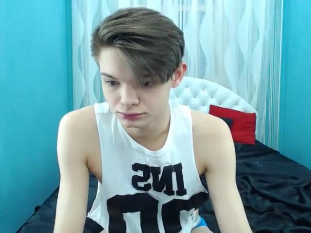 Young beautiful boy shows off smooth body on cam