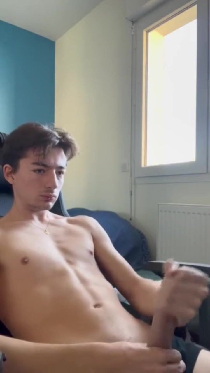 Hot twink strokes cock and cums