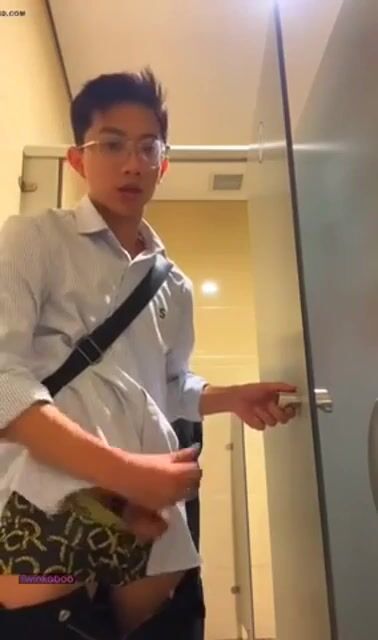 Hung asian twink wanks cums in public restroom
