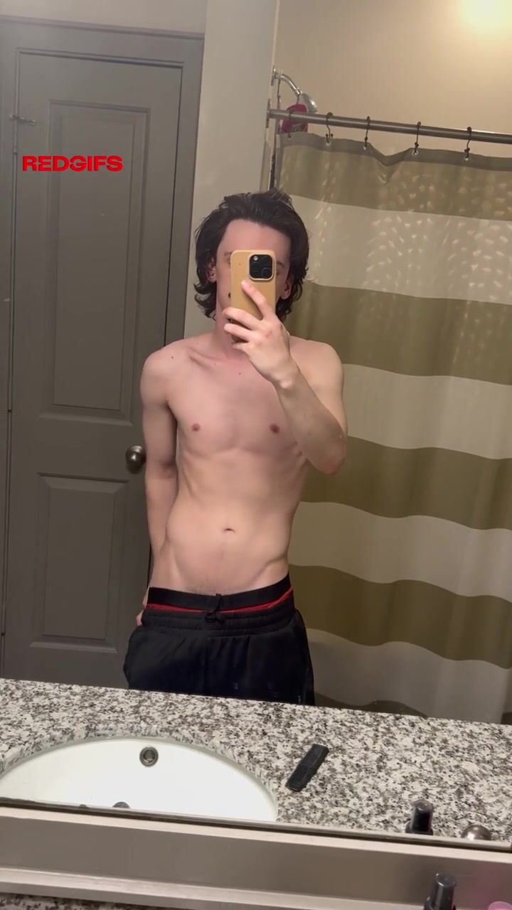 Hung twink flashes huge cock in bathroom
