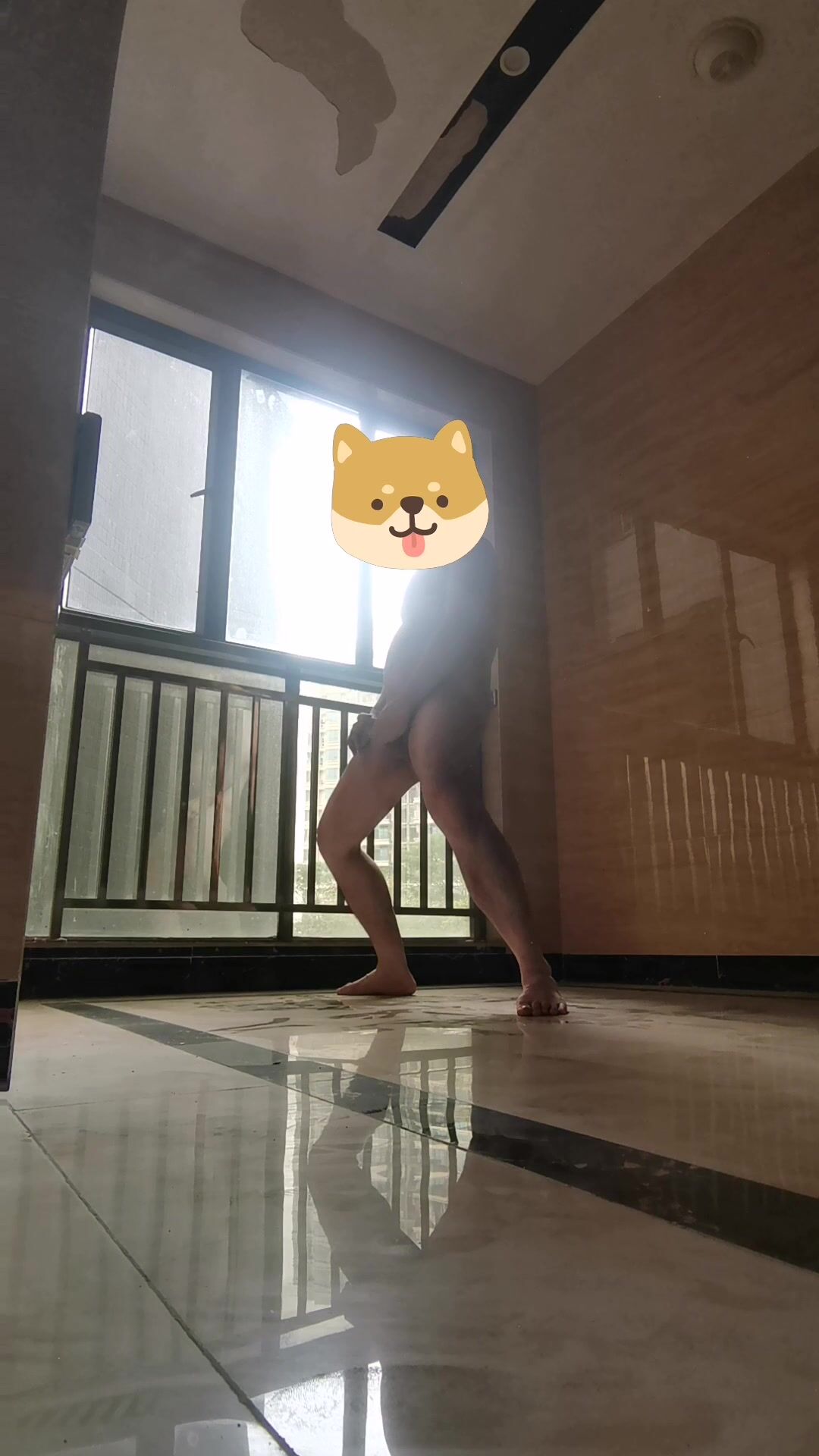 I swing my dick to show to the people in the opposite building