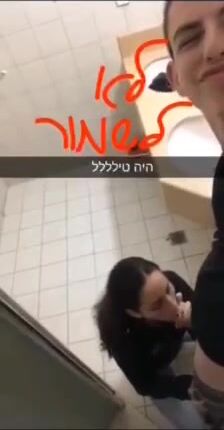 Teen girl sucks israeli boyfriend in a public toilet