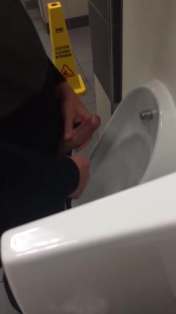 Urinal jerk and cum