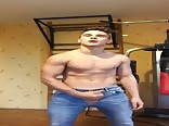 Jock boy jerks his cock in bed