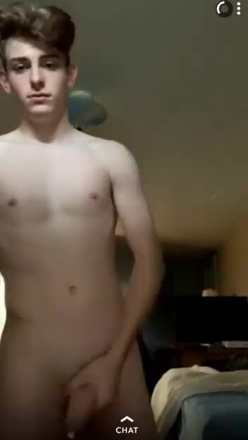 Kaden jacks his hard cock bareback in bedroom