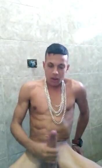 Latin teen twink strokes cock in bathroom