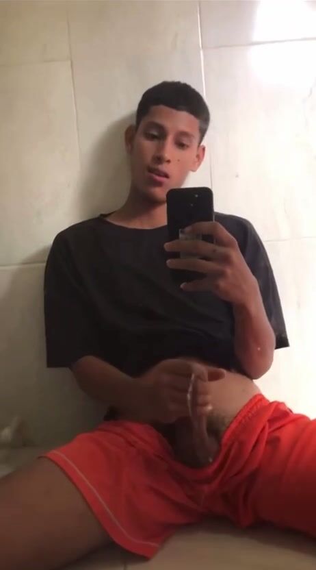 Latino twink cums hard in gay porn
