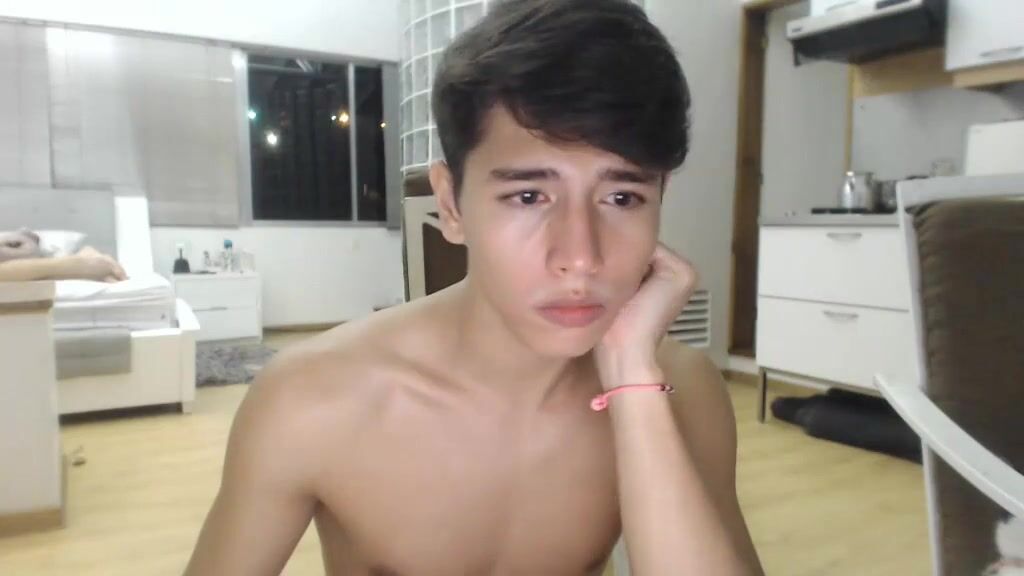 Cute latino boy strokes cock on cam
