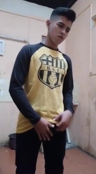 Latino stud jerks his cock in public toilet