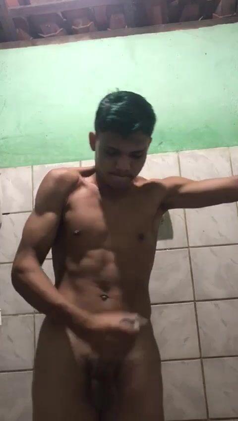 Latino muscle boy wanks and cums