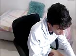Latino twink handles his bulge while hanging out