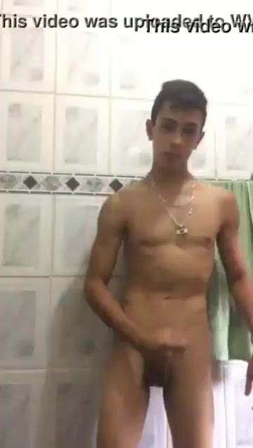Latino stud strips, strokes hard cock and cums