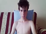Little handjob in the living room of his parents