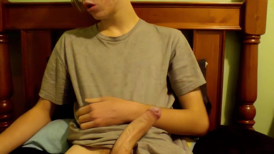 Blond teen boy strokes his big uncut cock