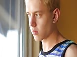 Blondie boy wanks big cock in solo action