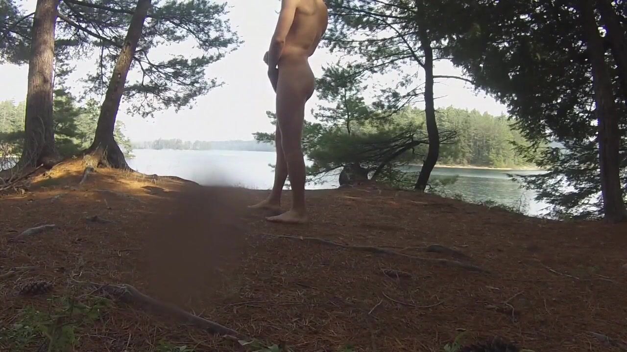 Twink masturbating by the lake