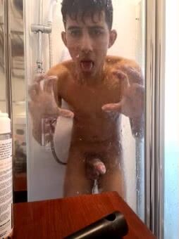 Mexican twink strokes cock for girl in shower