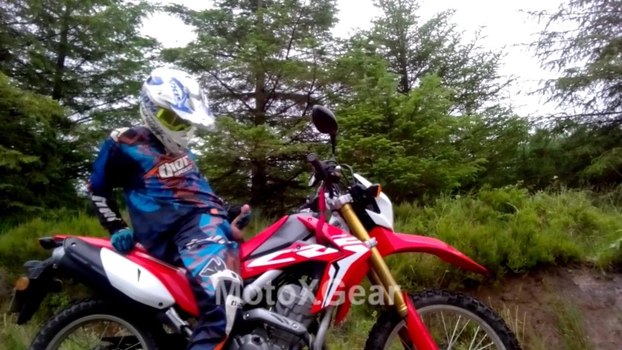 Motorsport twink strokes cock & cums outdoors