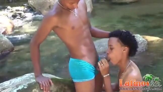 Movies - two sweet sexy and young latinos over the tropical river.