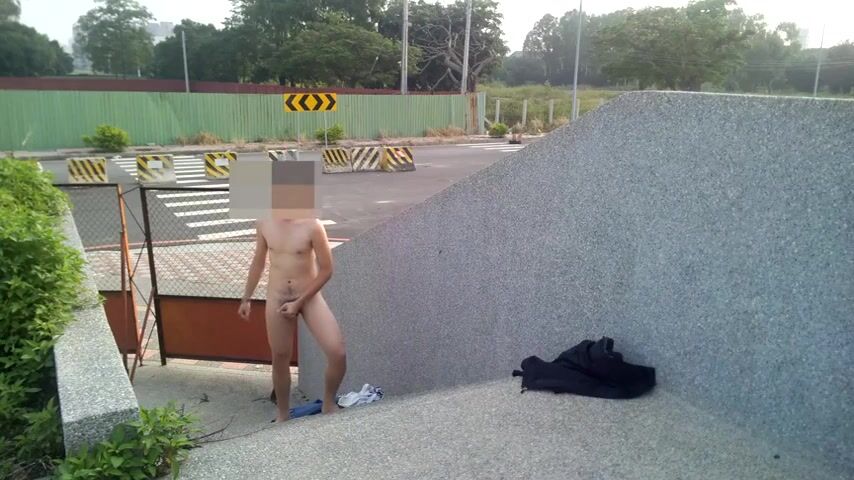 Naked asian boy outside
