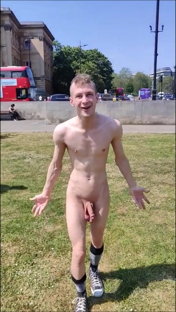 Naked happy boy in public