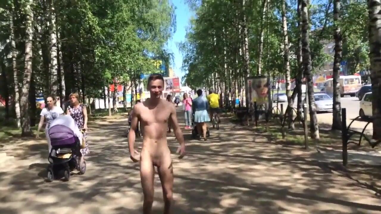 Russian twink strips naked on street