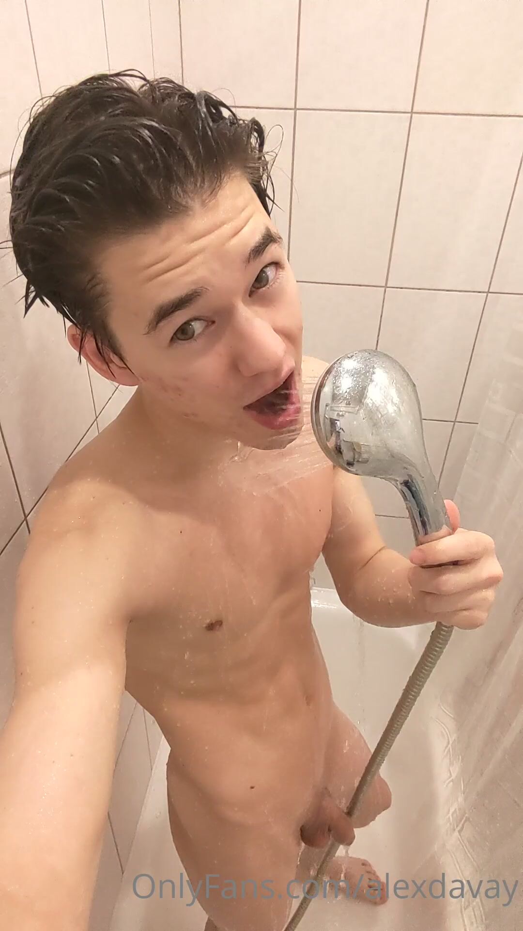 Cute twink gets nice shower action