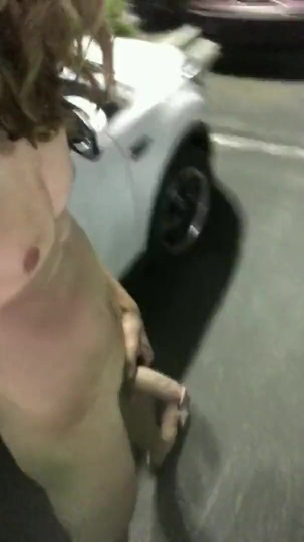 Cum-sprayed twink nude in parking lot