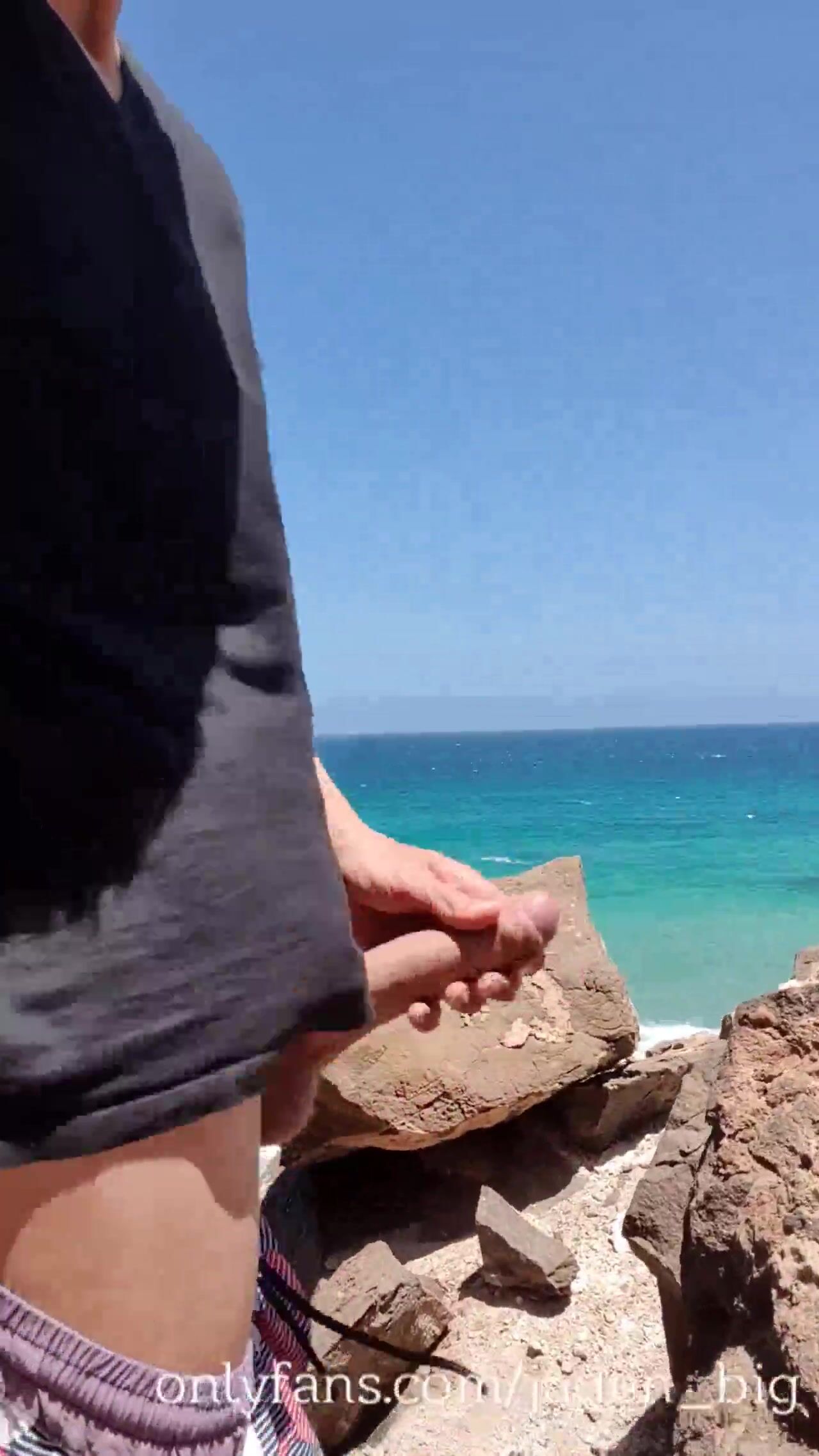 Jaden strokes his big cock outside