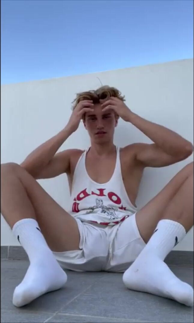 Twink in gorgeous football shorts: peek a boo