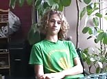 Curly blond boy shows off