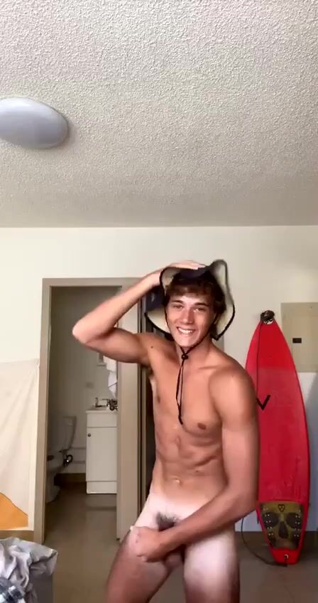 Red surfboard surfer boy showing off